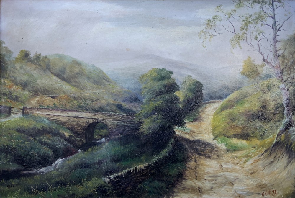 A 19th-century Victorian oil painting depicting a British rural landscape with a stone arch bridge, framed in an ornate gilded wooden frame. View III