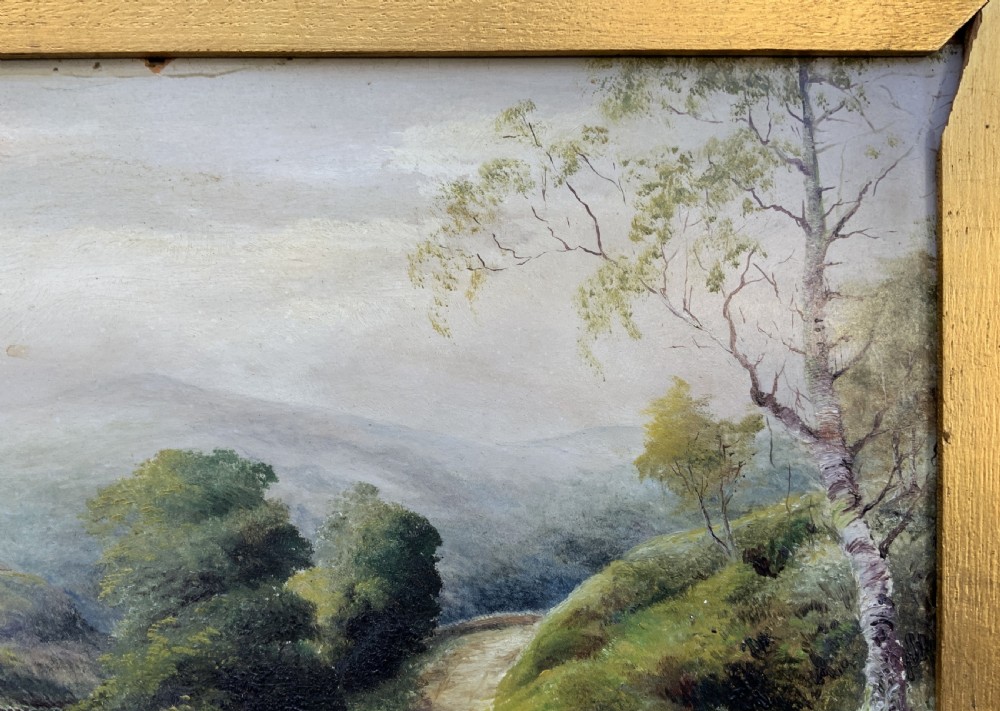 A 19th-century Victorian oil painting depicting a British rural landscape with a stone arch bridge, framed in an ornate gilded wooden frame. View IX