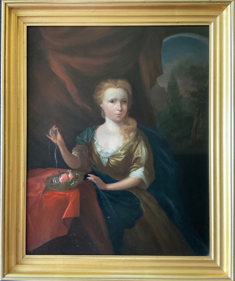 An antique oil painting depicting a seated woman beside a basket of flowers on a draped table, set within a gilded wooden frame.
