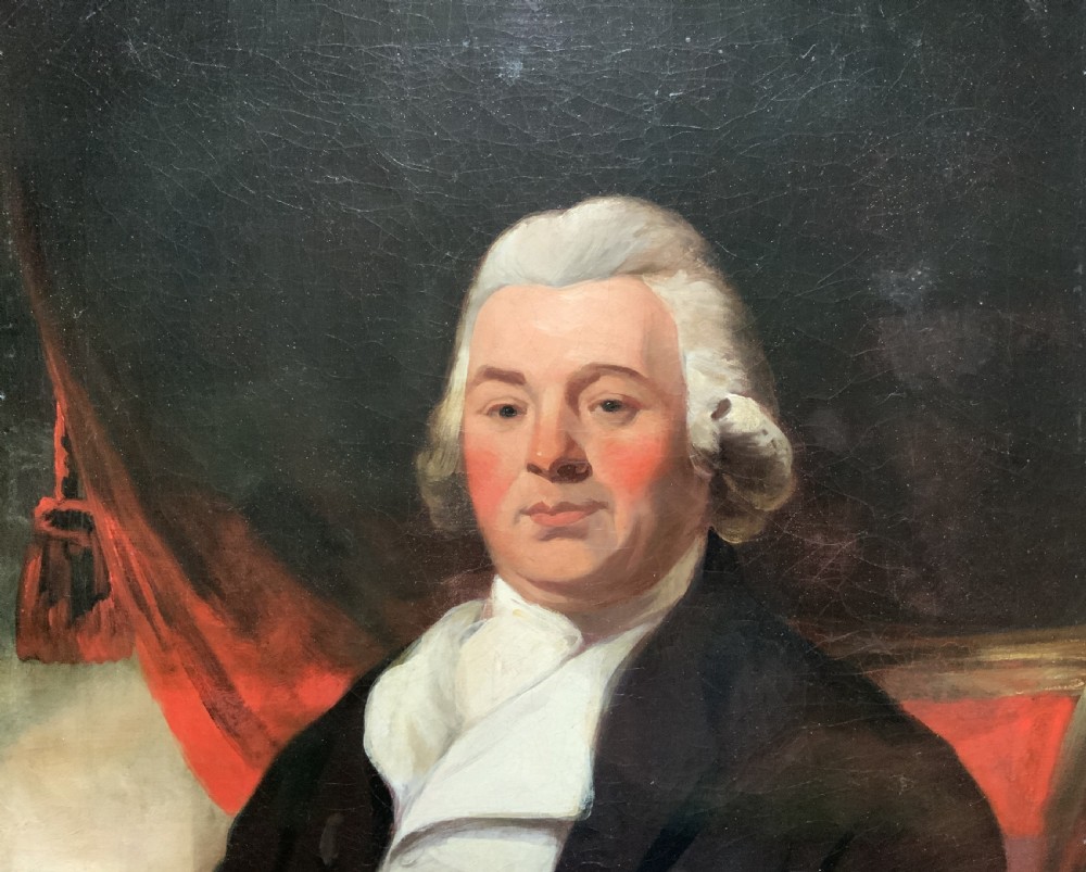An antique oil painting on canvas depicting a gentleman in Georgian attire within an ornate gilt frame. View VI