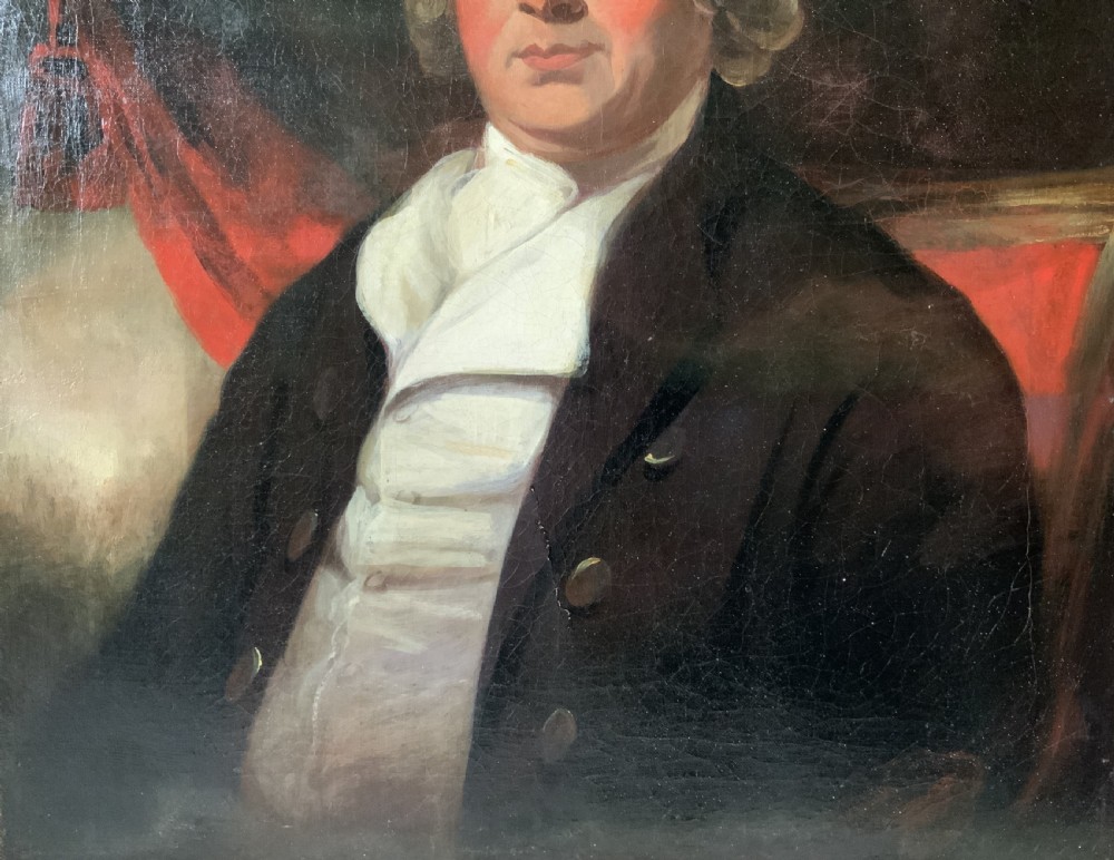 An antique oil painting on canvas depicting a gentleman in Georgian attire within an ornate gilt frame. View VII