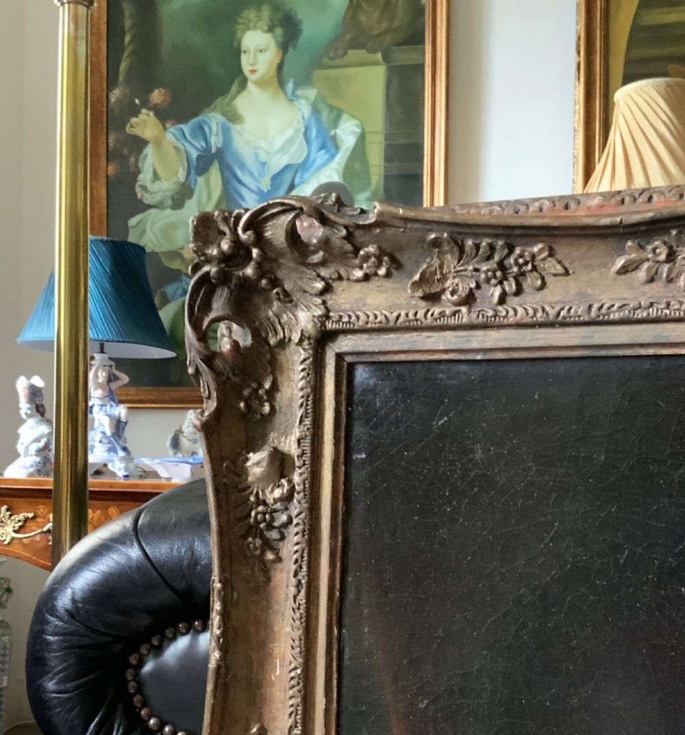 An antique oil painting on canvas depicting a gentleman in Georgian attire within an ornate gilt frame. View IX