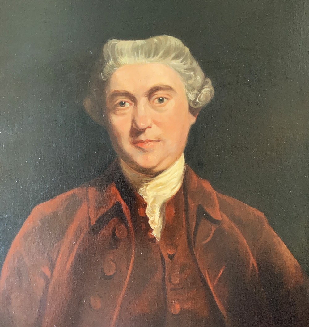 An oil portrait painting depicting an 18th-century gentleman in a burgundy coat and white cravat, set inside an ornate giltwood frame. View V