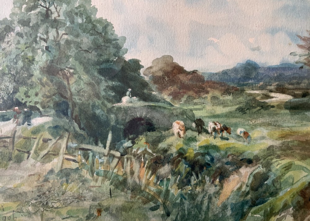 A framed antique watercolour painting depicting cattle grazing in a rural landscape, set within a layered mount and a moulded gilt frame. View VI