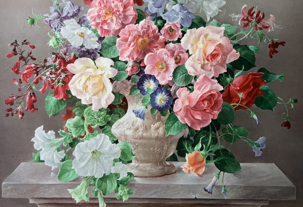 A framed oleograph print depicting a bouquet of pink, red, and blue garden flowers in an ornate ceramic urn on a stone ledge, enclosed within a decorative gilded frame. View IV