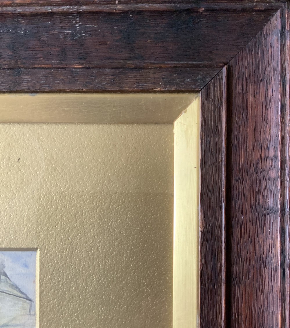 An panoramic Edwardian watercolour painting depicting horses and a coach outside the Coach and Horses Hotel, presented in a wooden frame. View XII