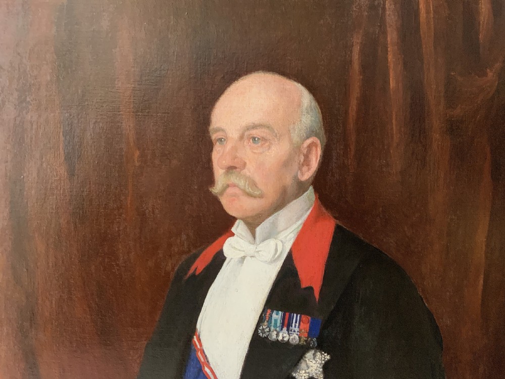 An antique oil painting depicting a military officer in formal dress uniform with medals, housed inside an ornate gilded wooden frame. View V
