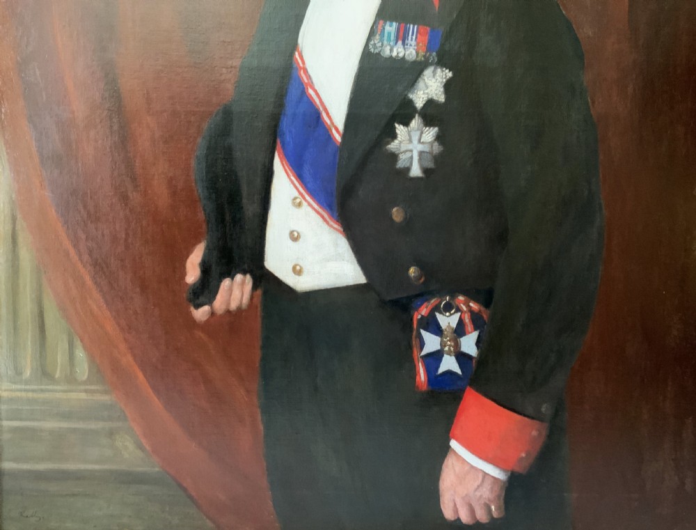 An antique oil painting depicting a military officer in formal dress uniform with medals, housed inside an ornate gilded wooden frame. View VI