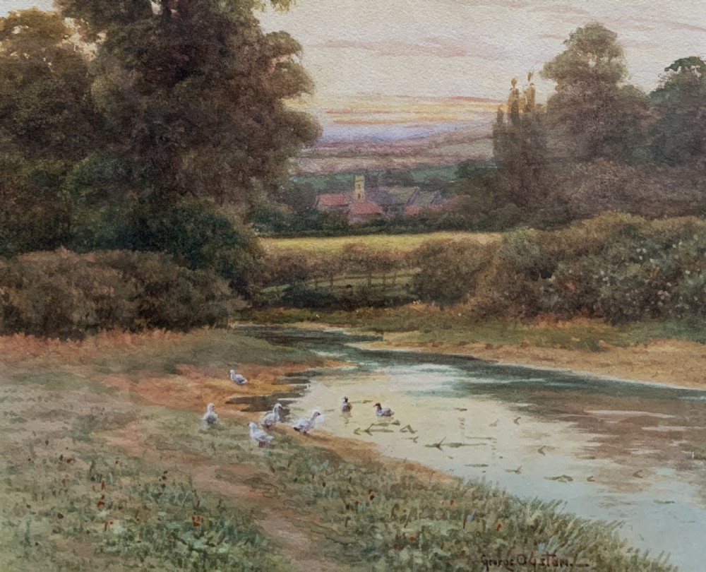 A framed watercolour painting depicting a tranquil river landscape in Buckinghamshire with trees and birds, set inside a gold mount and beaded gilt frame. View III