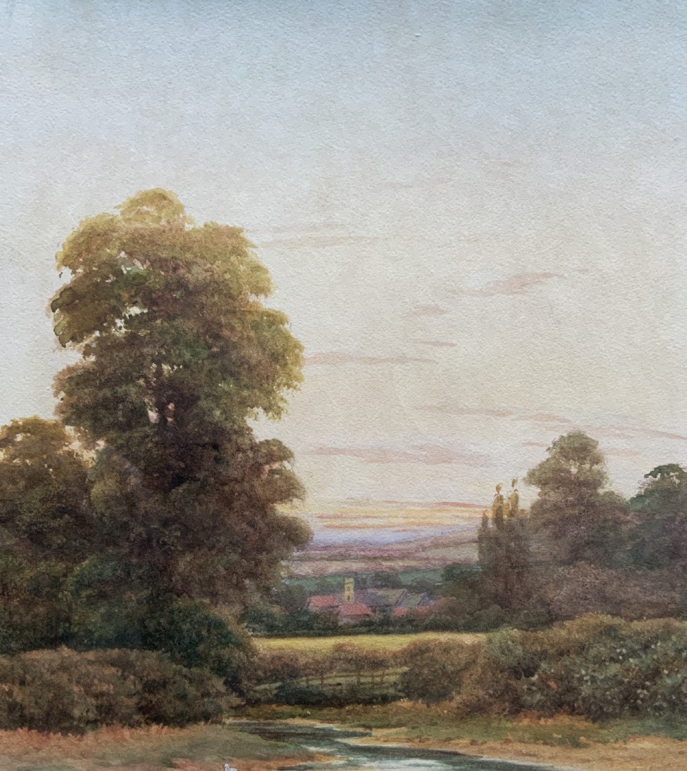 A framed watercolour painting depicting a tranquil river landscape in Buckinghamshire with trees and birds, set inside a gold mount and beaded gilt frame. View IV