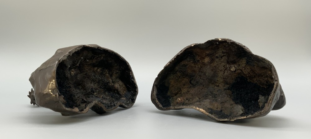A pair of patinated dark bronze Japanese mythical creature statues positioned on sculpted rocky bases. View XVIII