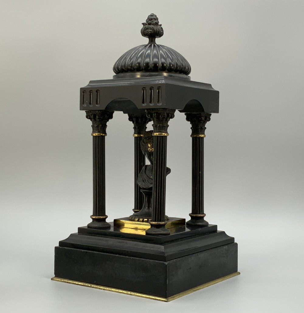 A 19th-century patinated bronze and black marble classical domed temple featuring fluted columns and a central classical bust. View V