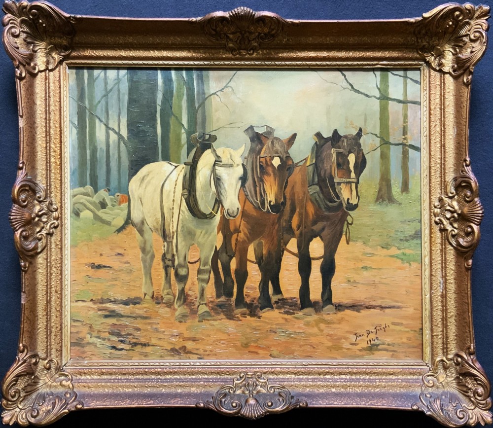 A framed 1948 oil painting depicting three harnessed working horses standing in a autumn forest setting within a gold gilded frame.