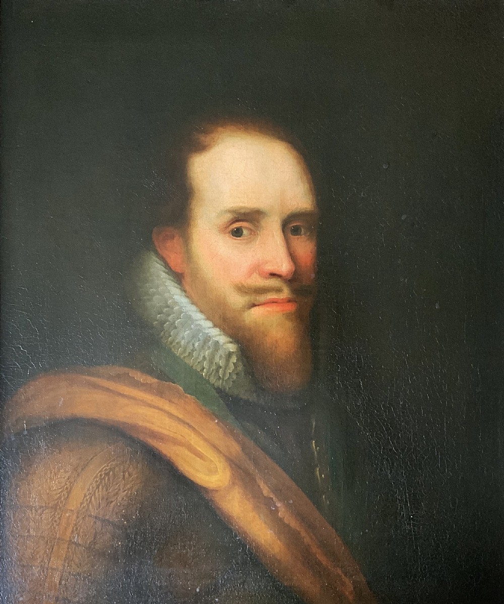 A 17th-century Dutch Old Master oil portrait of a man with a beard, lace ruff, and armour, presented in a light-coloured moulded wooden frame. View III