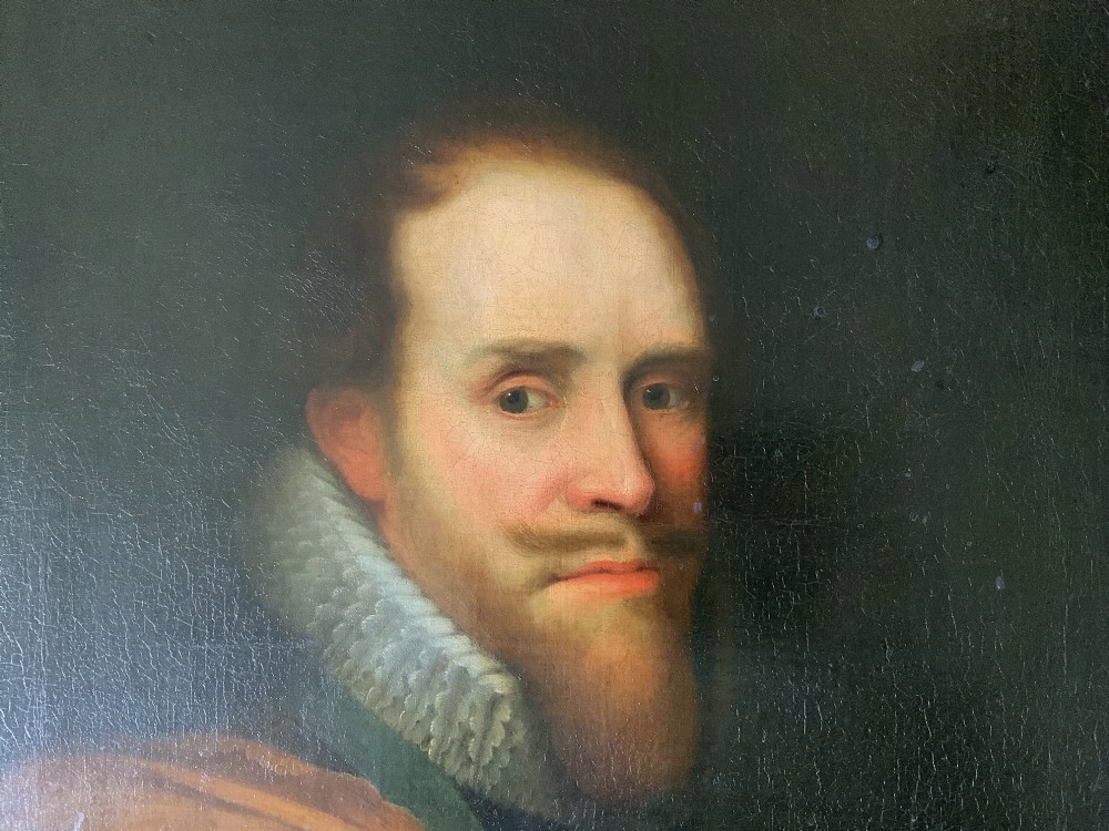 A 17th-century Dutch Old Master oil portrait of a man with a beard, lace ruff, and armour, presented in a light-coloured moulded wooden frame. View V