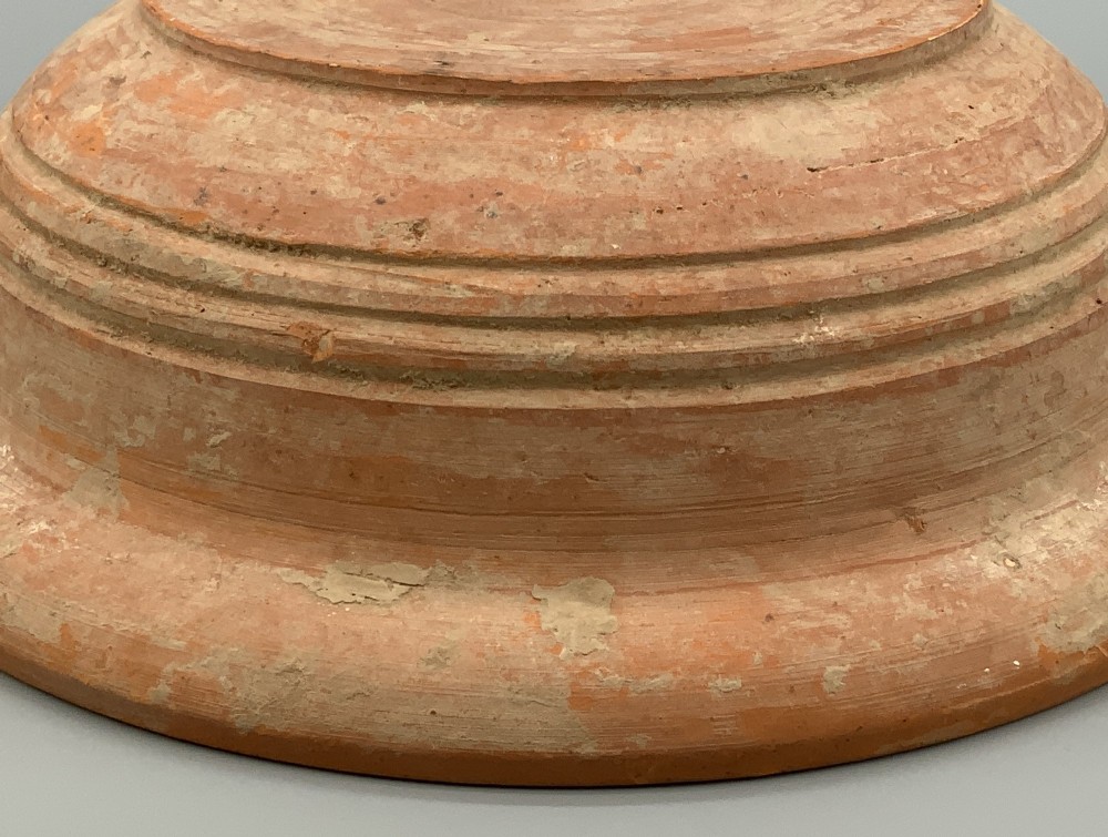 A pair of circular Han Dynasty red terracotta pottery basins featuring broad everted rims and horizontal exterior grooves. View IX