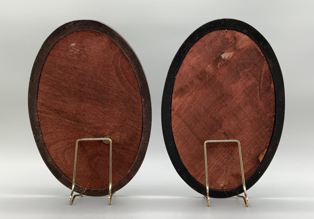 A pair of Japanese Meiji period miniature portrait paintings in oval dark rosewood frames, depicting women in 19th-century style dresses. View X