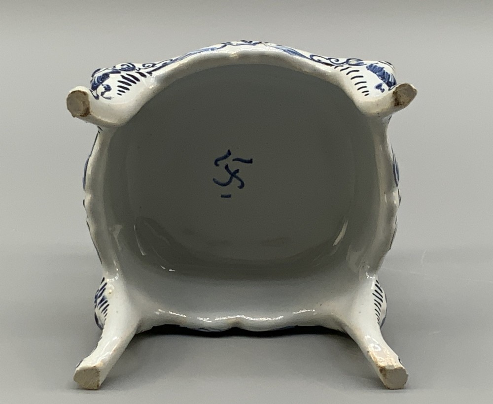 A late 19th-century miniature porcelain armchair glazed in white and hand-painted with blue Dutch landscape scenes featuring a windmill. View XIII
