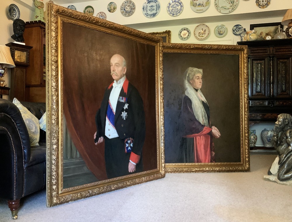 An Edwardian portrait painting of a military officer wearing decorations and set within a carved gold frame. View XIII