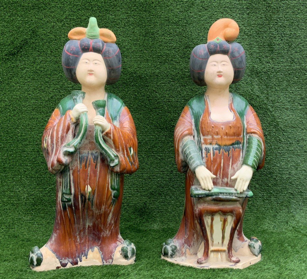 A pair of standing terracotta female musician figures in Tang Dynasty style, finished with amber, green, and cream Sancai lead glazes. View II