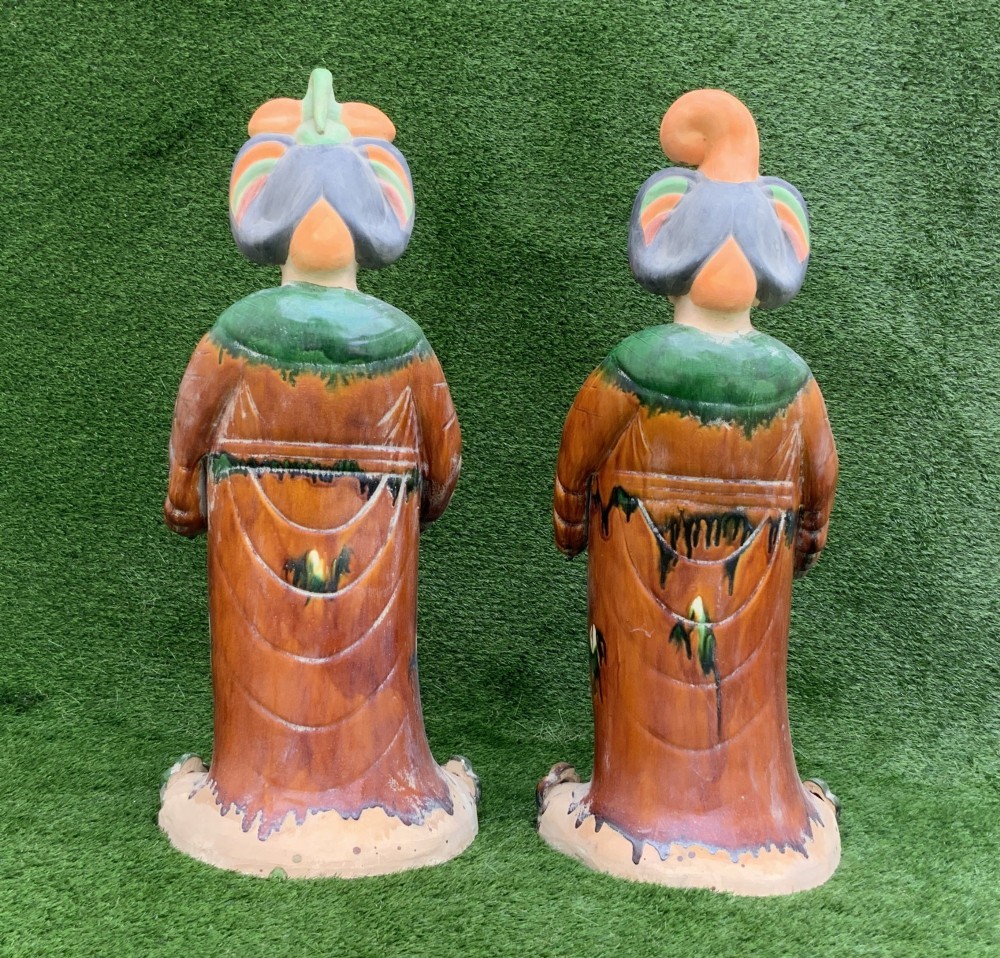 A pair of standing terracotta female musician figures in Tang Dynasty style, finished with amber, green, and cream Sancai lead glazes. View VI