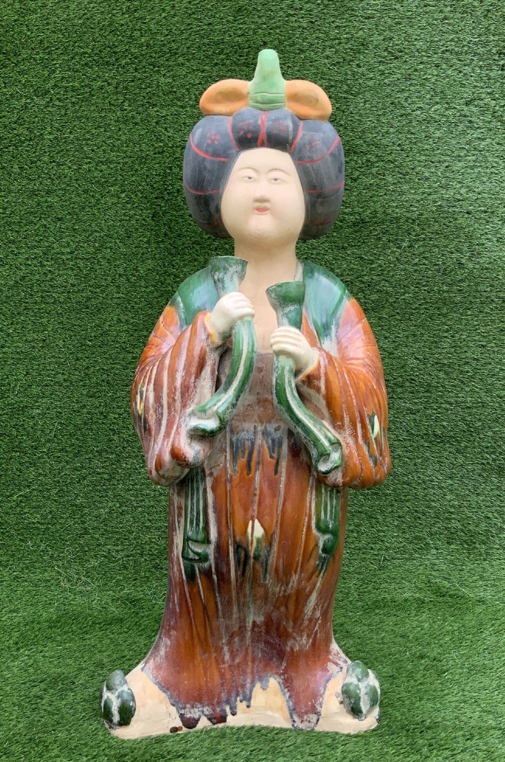 A pair of standing terracotta female musician figures in Tang Dynasty style, finished with amber, green, and cream Sancai lead glazes. View XI