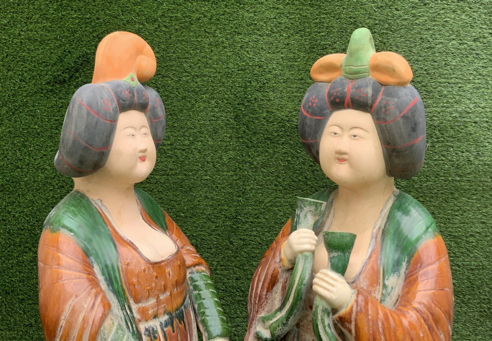 A pair of standing terracotta female musician figures in Tang Dynasty style, finished with amber, green, and cream Sancai lead glazes. View XIII