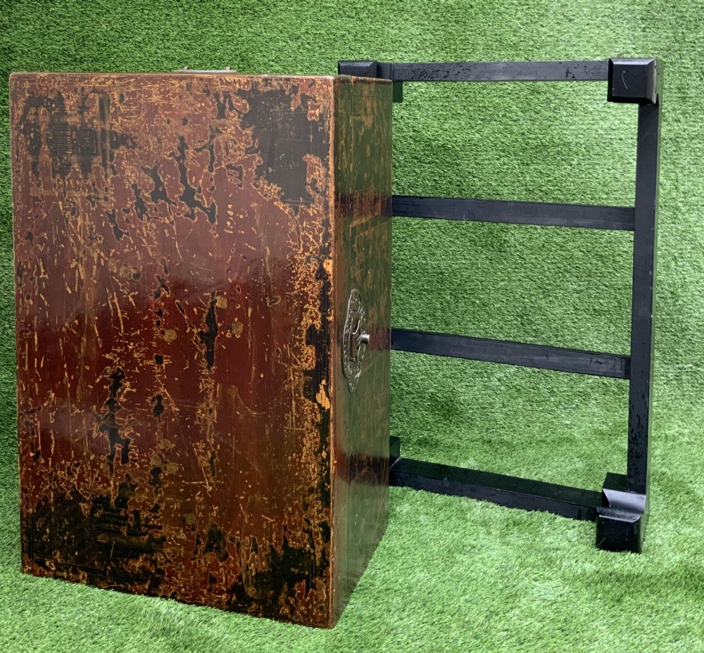 A large rectangular Japanese lacquered storage chest with gilt figurative Chinoiserie scenes set upon a black painted wooden stand. View XI