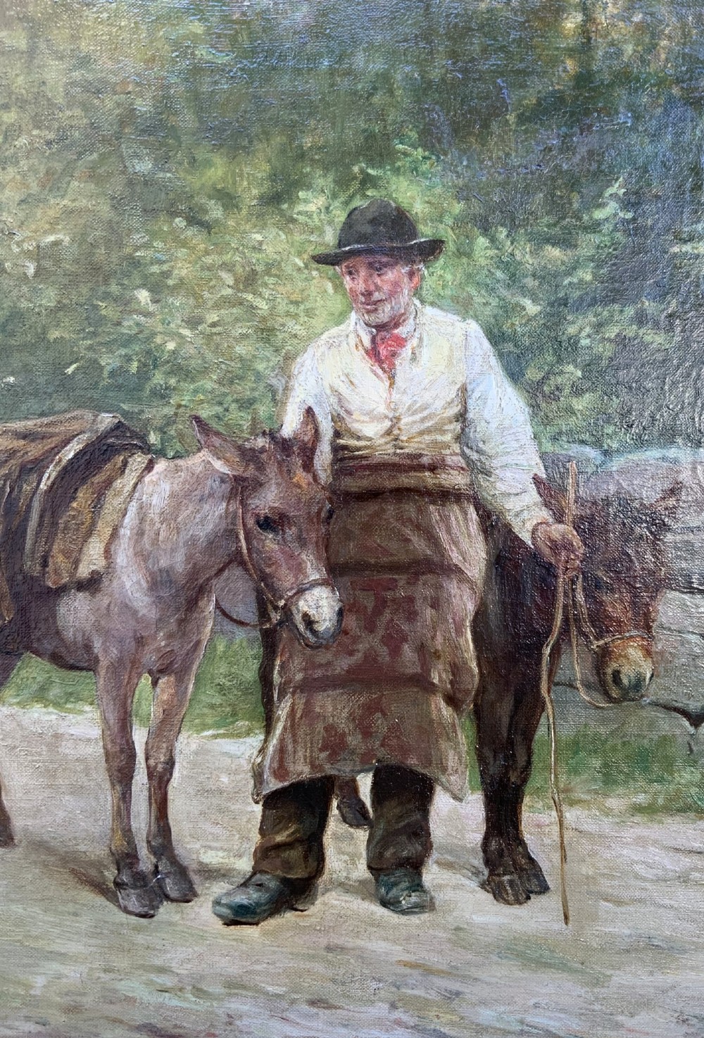 A nineteenth-century Victorian oil painting depicting a rural scene with figures and donkeys, housed inside an ornate carved giltwood frame. View VII