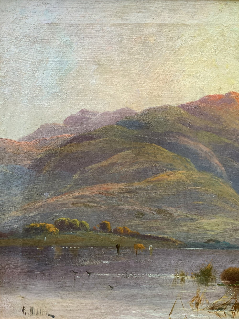 A nineteenth-century oil painting on canvas depicting a Scottish loch and mountains illuminated by a sunset, displayed within a gilt carved frame. View VII