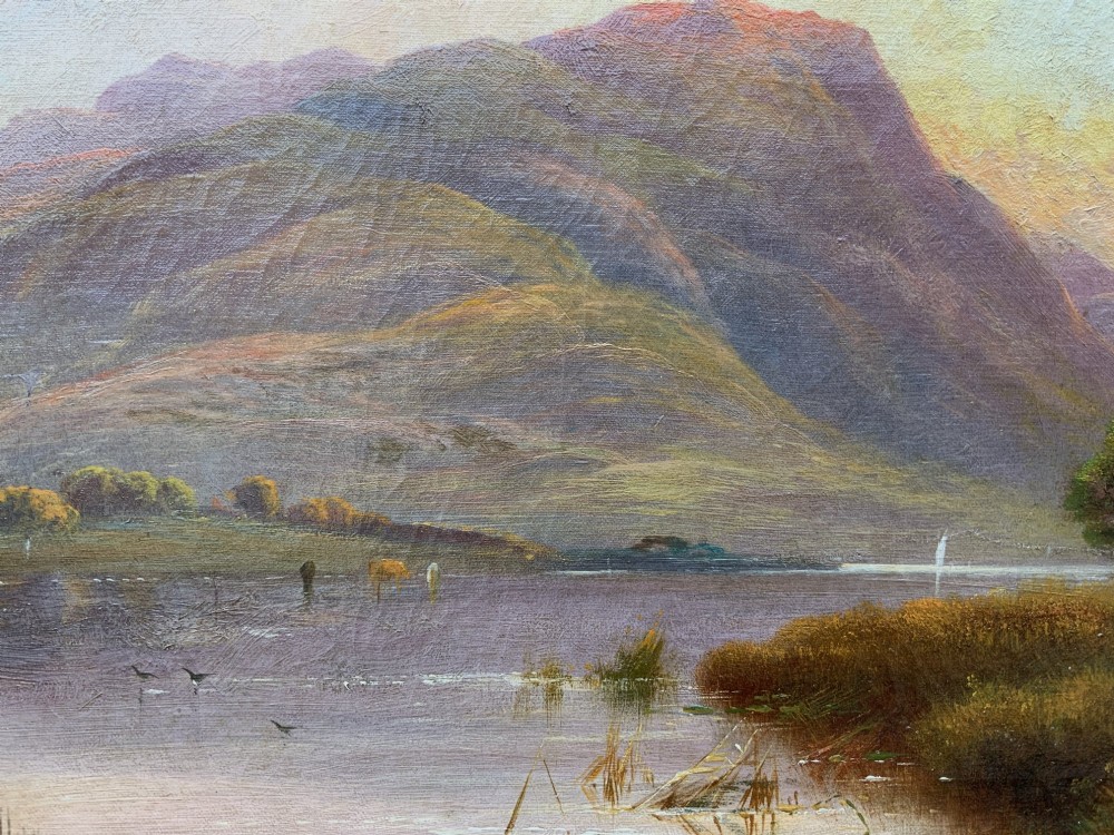 A nineteenth-century oil painting on canvas depicting a Scottish loch and mountains illuminated by a sunset, displayed within a gilt carved frame. View VIII