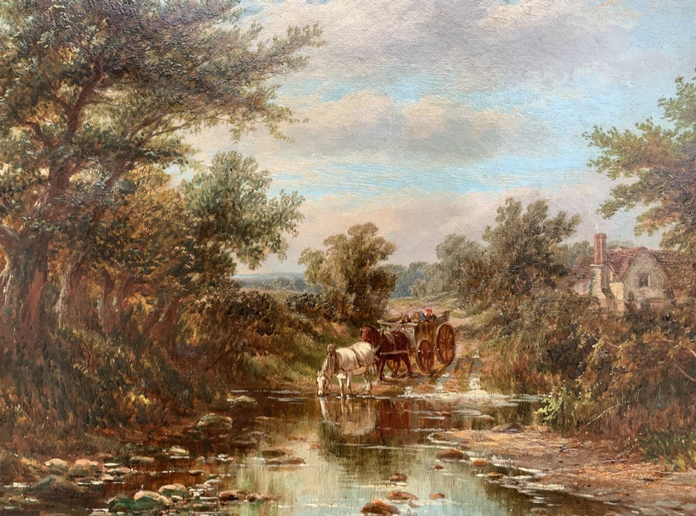 A Victorian landscape oil painting depicting a rural scene with a horse-drawn cart crossing a stream beside mature trees and a cottage, set in an ornate gilt frame. View III