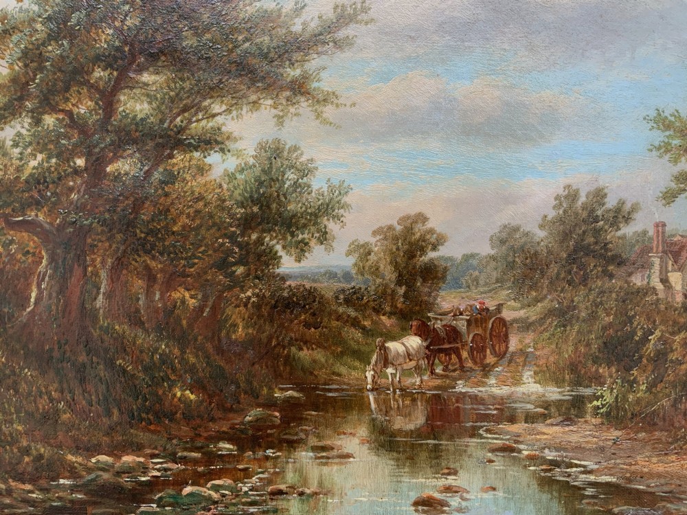 A Victorian landscape oil painting depicting a rural scene with a horse-drawn cart crossing a stream beside mature trees and a cottage, set in an ornate gilt frame. View VII
