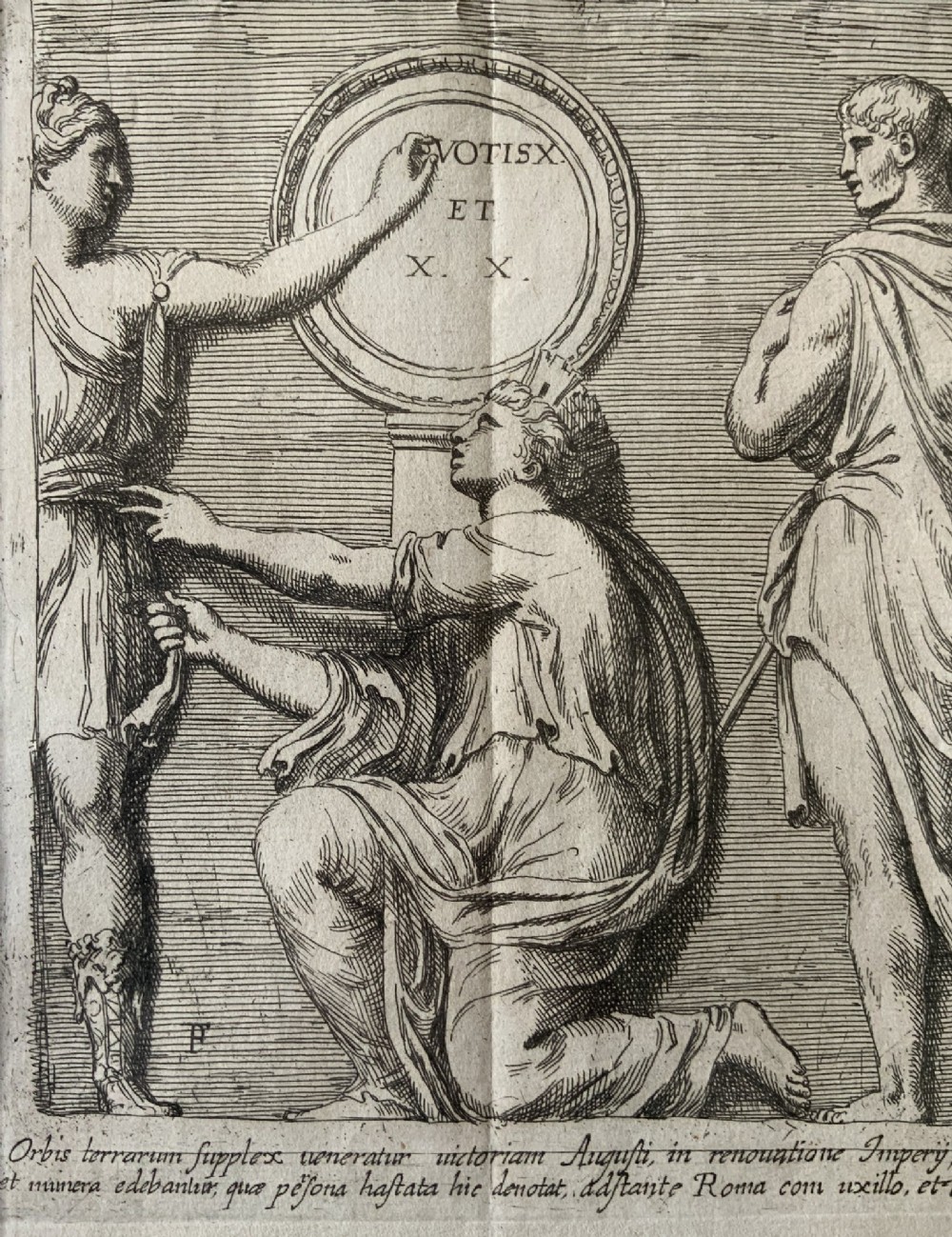 A monochrome 17th-century etching depicting four Classical Roman figures with drapery alongside Latin inscriptions. View V