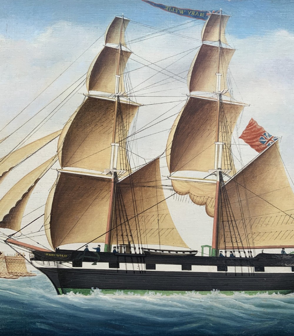 A 19th-century maritime oil painting depicting the brig Mary Wylie entering Malta harbour in a dark and gilt wood frame. View V