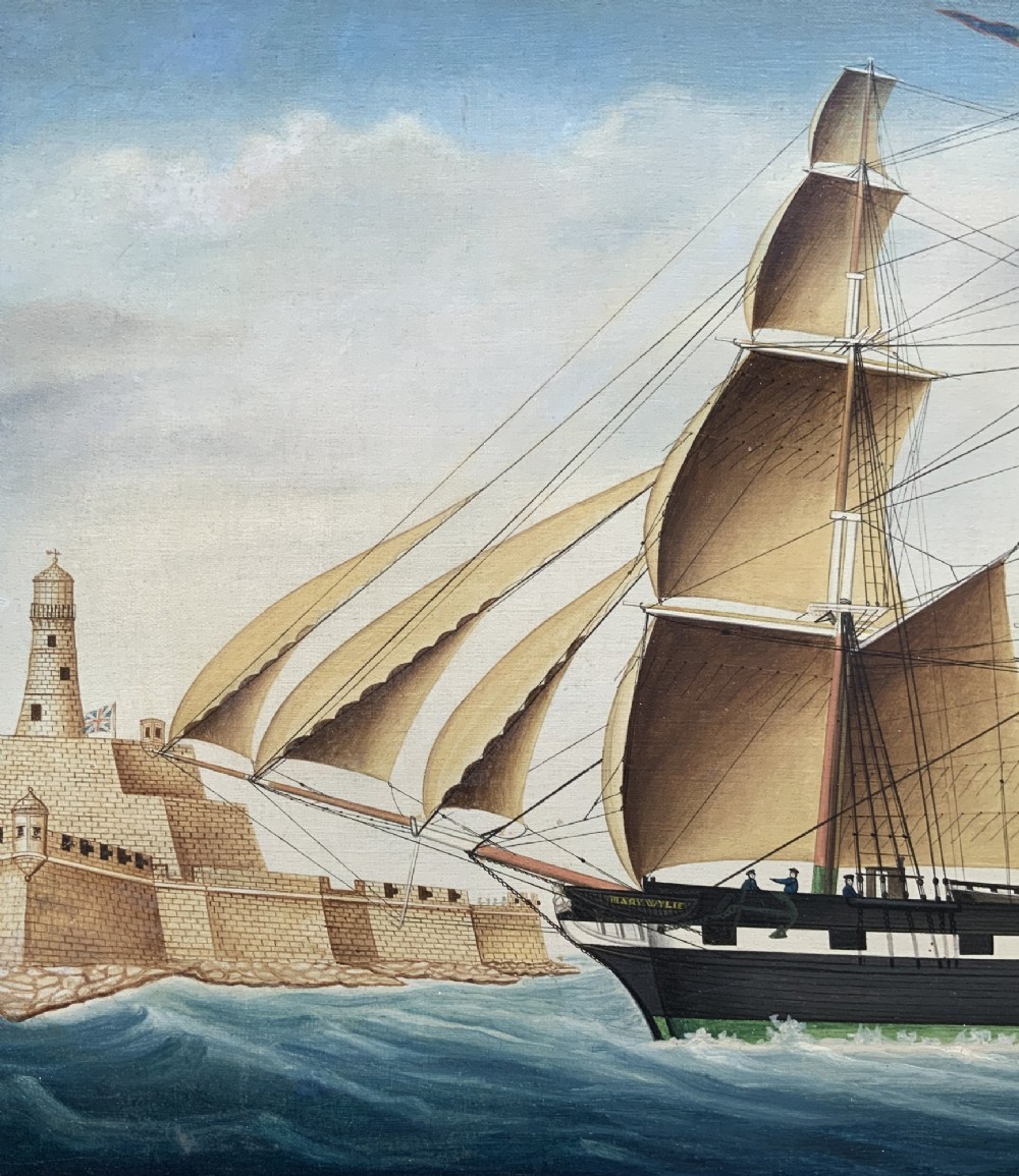 A 19th-century maritime oil painting depicting the brig Mary Wylie entering Malta harbour in a dark and gilt wood frame. View VI