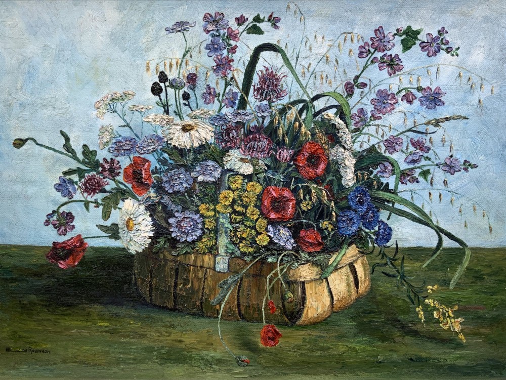 A framed floral still life oil painting depicting a woven basket filled with colourful wildflowers including poppies and daisies against a light blue backdrop. View III