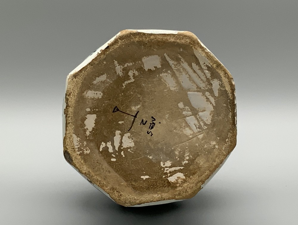 A 17th-century hexagonal Dutch Delft blue and white faience vase decorated with hand-painted chinoiserie figures and floral motifs. View XIII