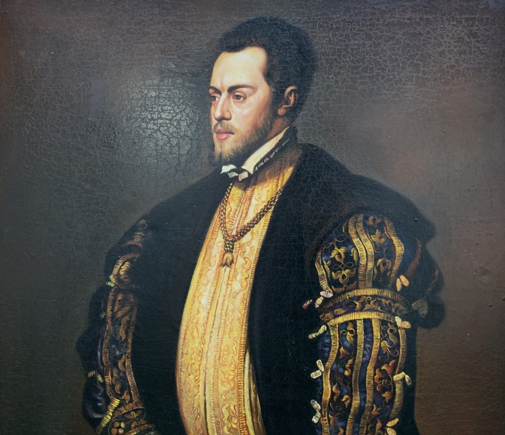 A full-length oil painting depicting Philip II of Spain in Renaissance attire, housed inside an ebonised frame with gilt mouldings. View IV