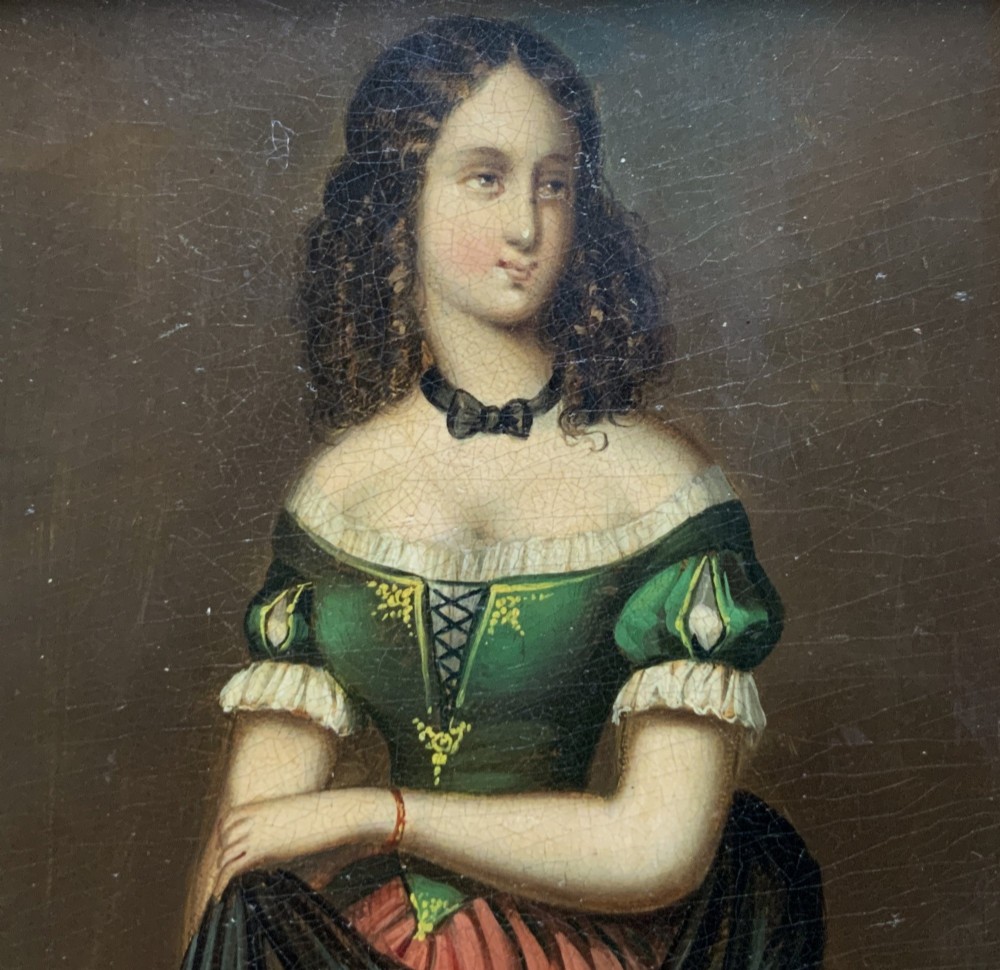 A framed miniature oil portrait depicting a Victorian woman with dark curly hair in a green and red dress, enclosed in a gilded wooden frame with egg-and-dart detail. View III