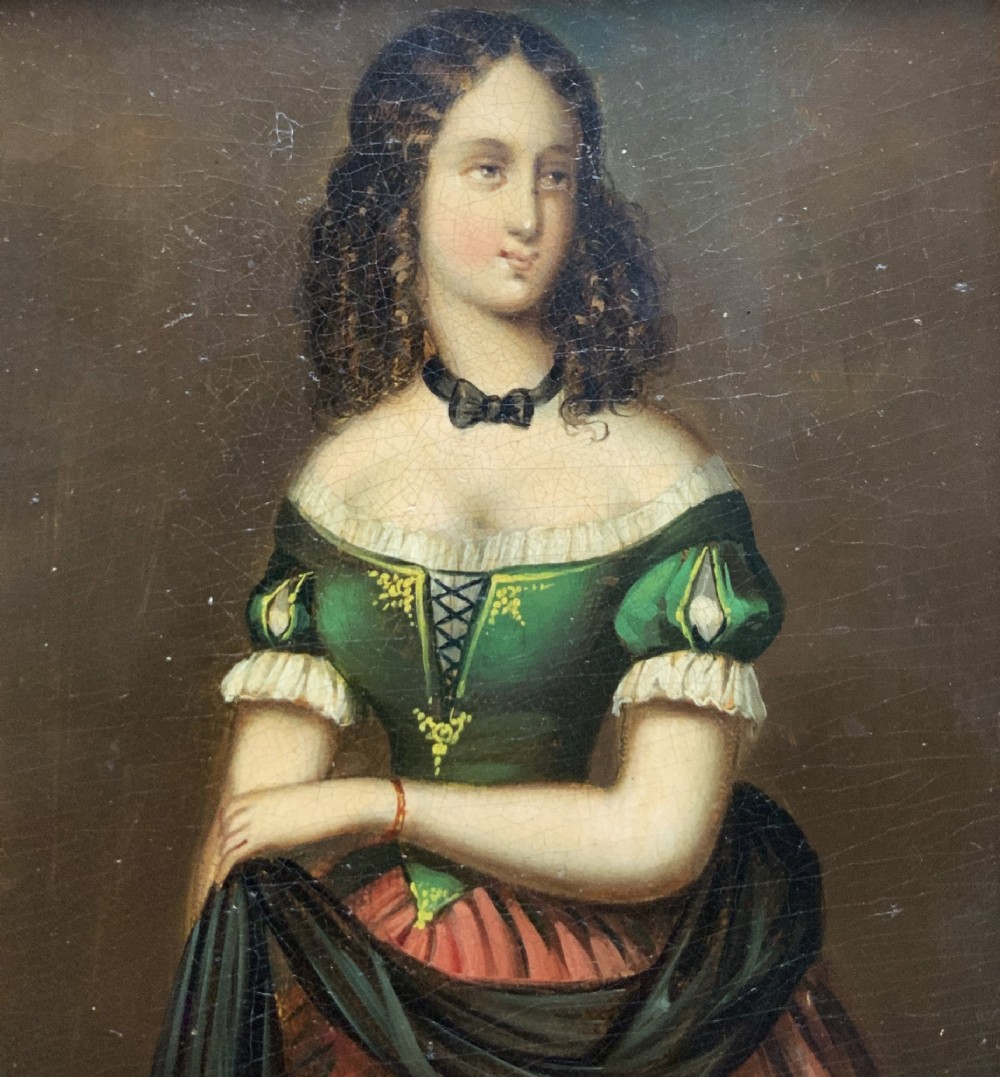 A framed miniature oil portrait depicting a Victorian woman with dark curly hair in a green and red dress, enclosed in a gilded wooden frame with egg-and-dart detail. View IV