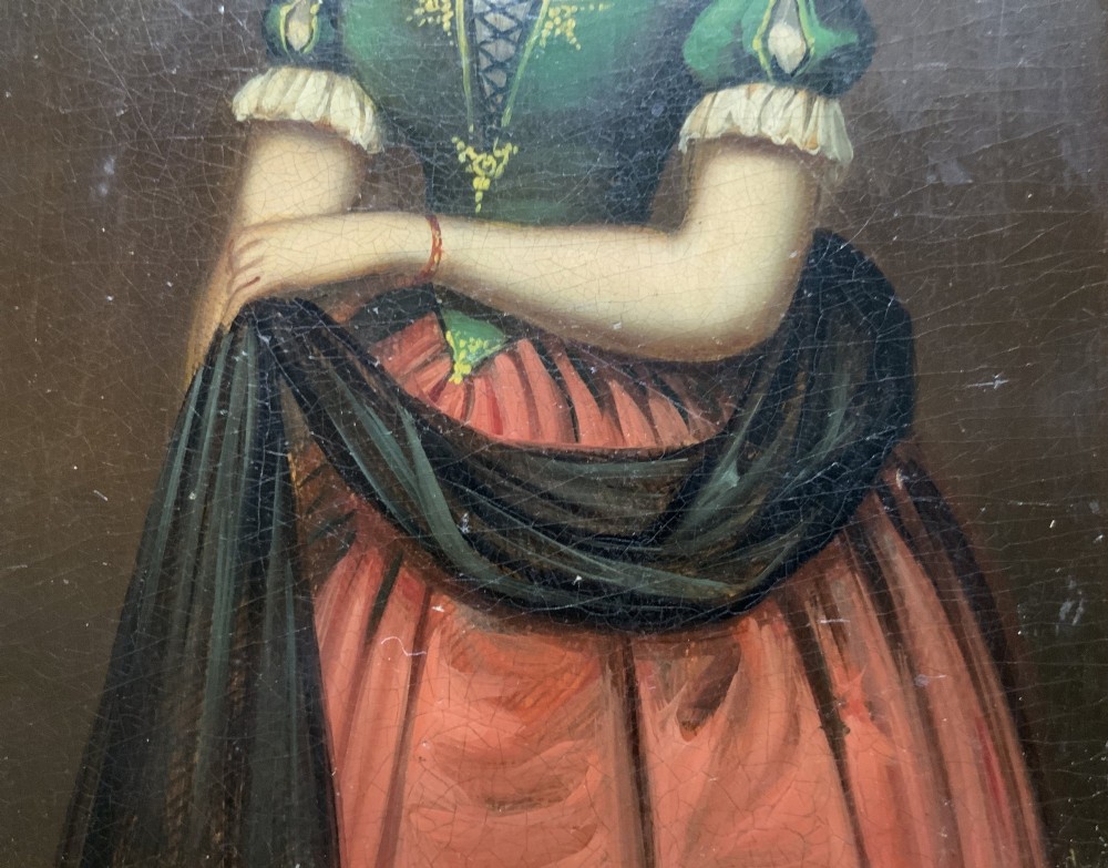 A framed miniature oil portrait depicting a Victorian woman with dark curly hair in a green and red dress, enclosed in a gilded wooden frame with egg-and-dart detail. View VII