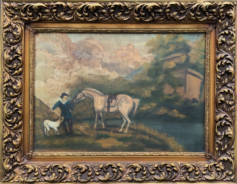 A naive equestrian oil painting depicting a grey horse, a handler in a blue jacket, and a dog beside a river, enclosed in a deeply carved gold gilt frame.