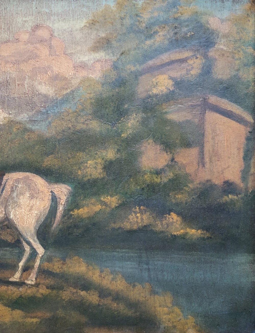 A naive equestrian oil painting depicting a grey horse, a handler in a blue jacket, and a dog beside a river, enclosed in a deeply carved gold gilt frame. View V