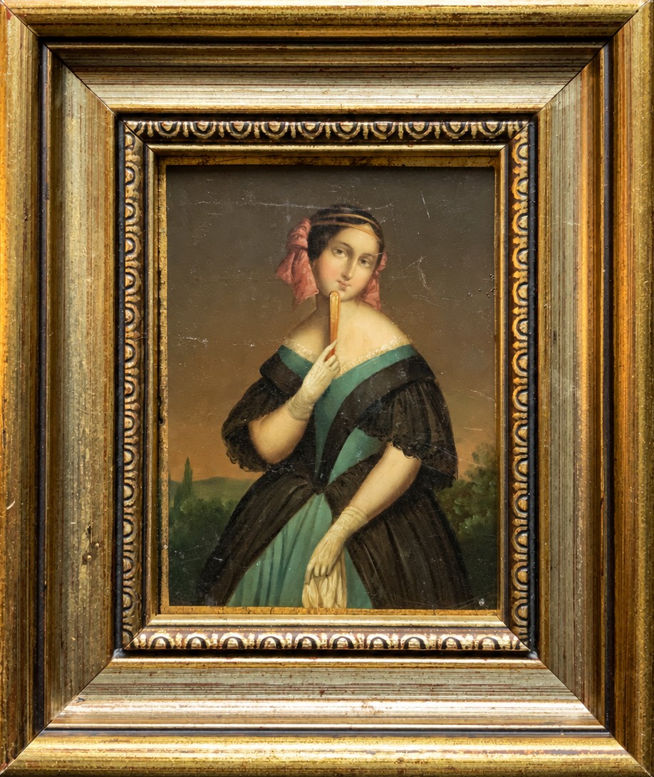 A framed 19th-century miniature oil painting depicting a seated woman in a teal dress and dark shawl holding a fan.