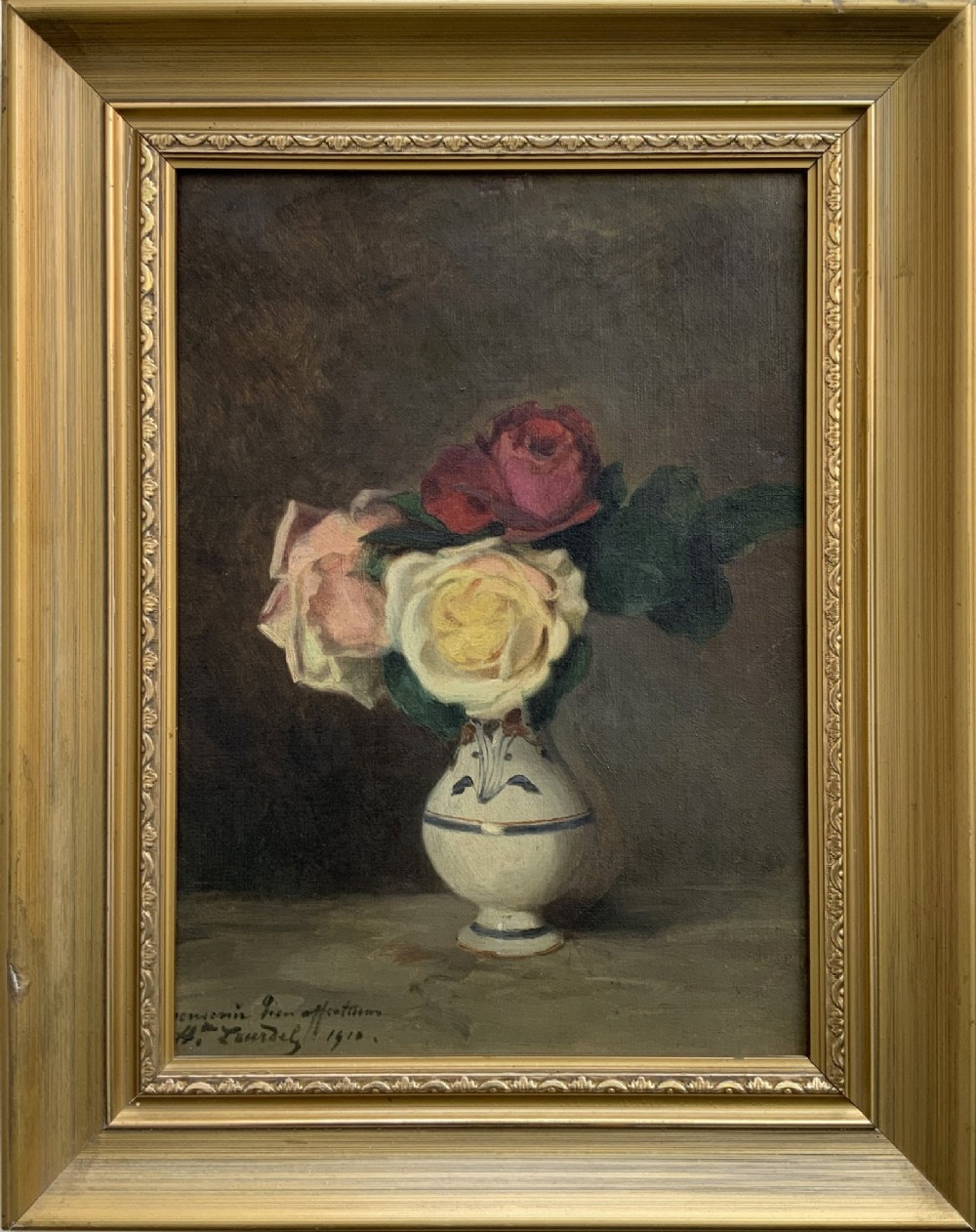 An early 20th-century French Impressionist oil painting depicting pink and yellow roses in a ceramic vase, housed within a moulded gold-gilded frame.