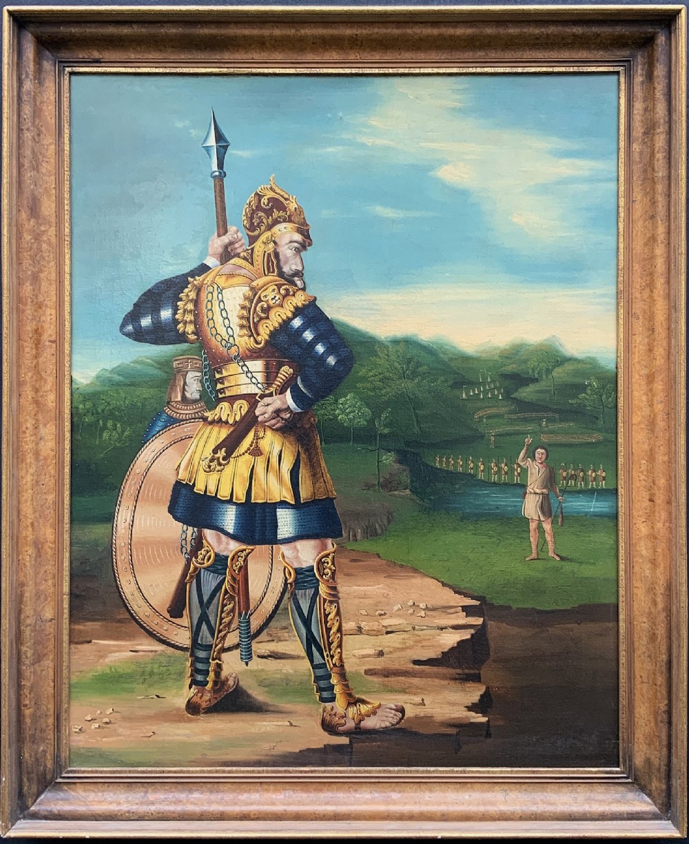 An antique framed oil painting depicting the biblical scene of David and Goliath set against a green mountainous landscape.
