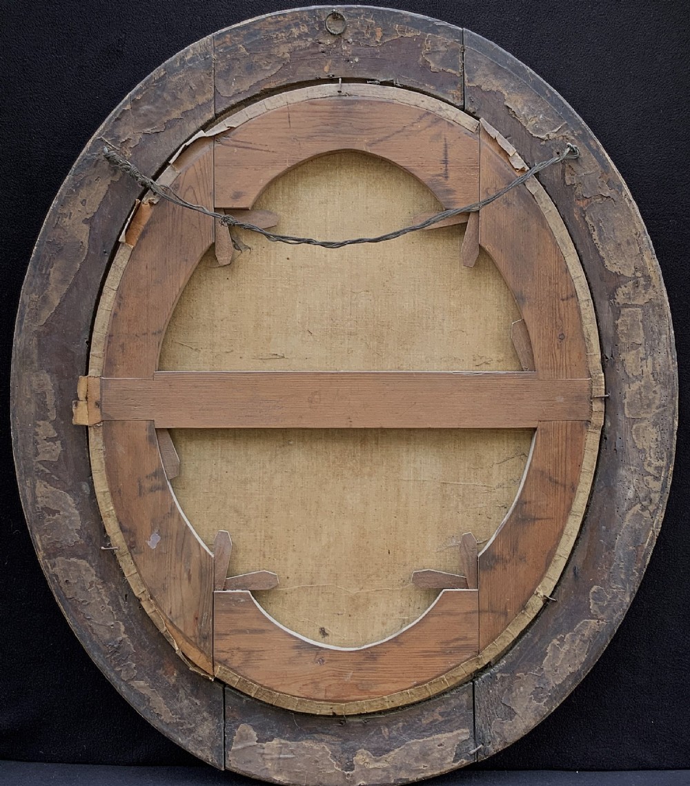 An oval 17th-century oil painting depicting a gentleman with grey hair, a moustache, and white falling bands collar in a carved gold frame. View V