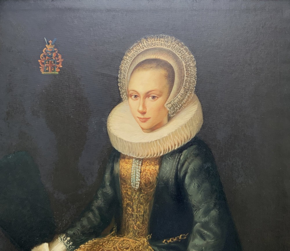 A full-length oil painting depicting a noblewoman dressed in a dark green gown, large white lace ruff collar, and bonnet, set within a dark frame. View III