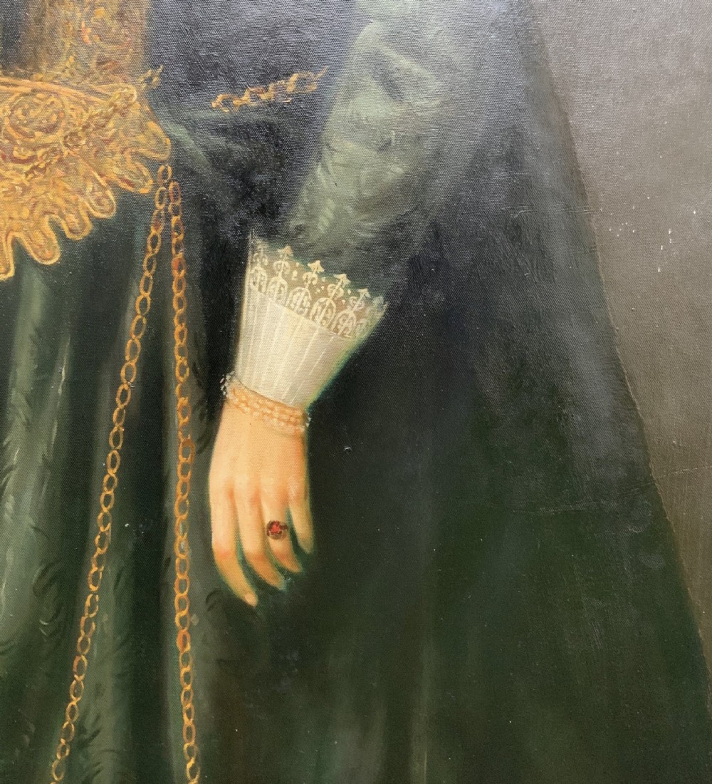 A full-length oil painting depicting a noblewoman dressed in a dark green gown, large white lace ruff collar, and bonnet, set within a dark frame. View XI